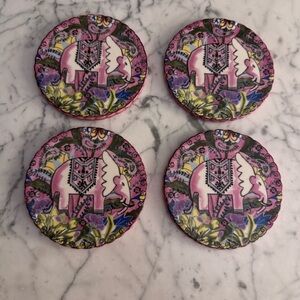 Ceramic elephant coasters, set of four, like new.